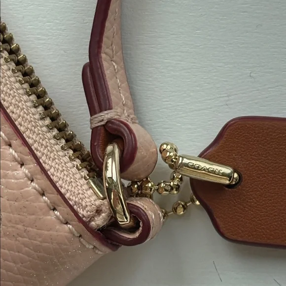 Coach Pink Floral Cutout Wristlet - Picture 2 of 6